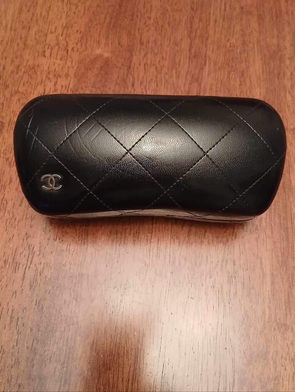 CHANEL Black Quilted Leather Sunglass Case with CC Emblem.Price is firm.